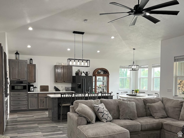 365 N 100 E, Ferron, UT 84523 - living area with wood finished floors, recessed lighting, a ceiling fan, and a chandelier