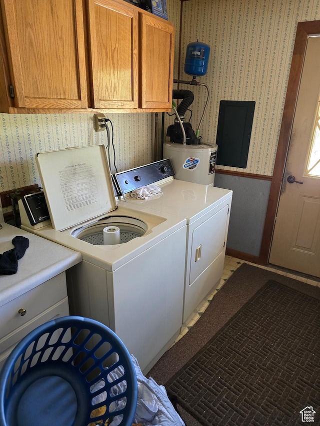 5654 E Cub Rd, Preston, ID 83263 - washroom featuring cabinet space, separate washer and dryer, wallpapered walls, water heater, and electric panel