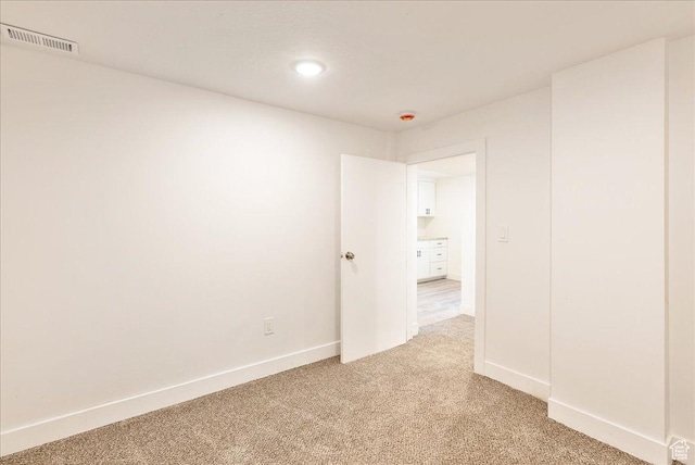 1042 E 460 S, Provo, UT 84606 - unfurnished room featuring light colored carpet, baseboards, recessed lighting, and a smoke detector