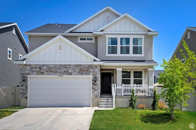 craftsman-style home with a porch, board and batten siding, concrete driveway, an attached garage, and stone siding