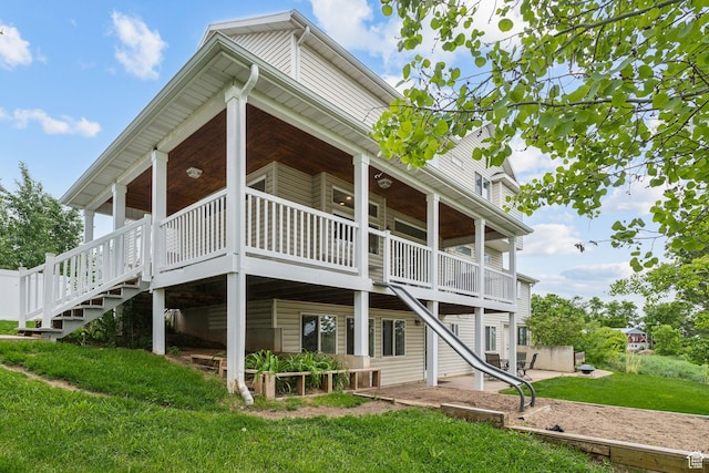 1001 E 1500 N, Layton, UT 84040 - rear view of house featuring a lawn, stairs, and a patio