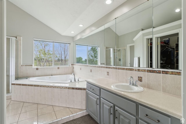 1001 E 1500 N, Layton, UT 84040 - bathroom featuring lofted ceiling, a shower stall, vanity, a bath, and recessed lighting