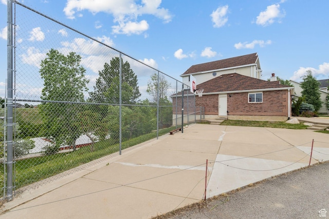 1001 E 1500 N, Layton, UT 84040 - view of basketball court featuring basketball hoop and fence