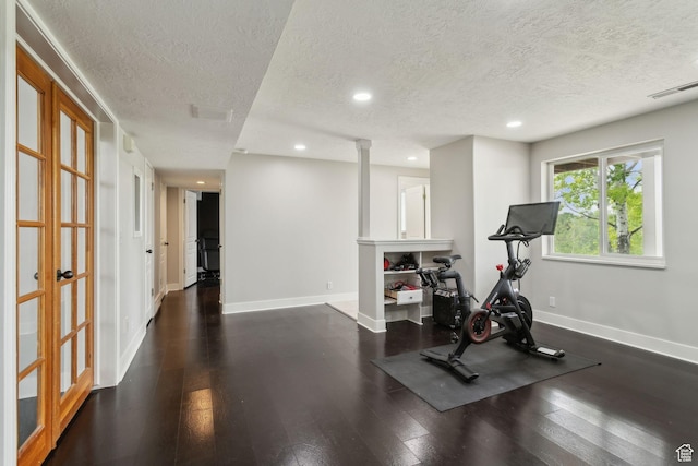 1001 E 1500 N, Layton, UT 84040 - workout room featuring a textured ceiling, recessed lighting, hardwood / wood-style floors, baseboards, and ornate columns