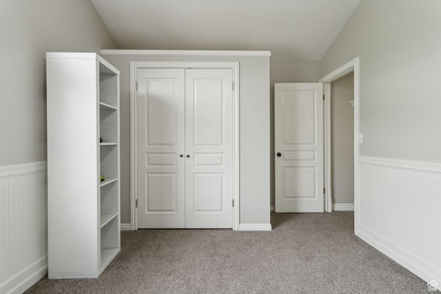 1001 E 1500 N, Layton, UT 84040 - unfurnished bedroom featuring wainscoting, a closet, and carpet flooring