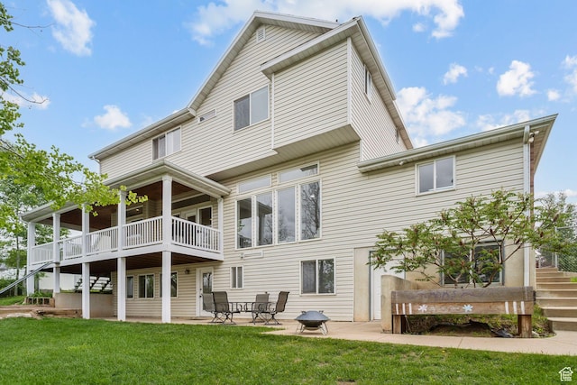 1001 E 1500 N, Layton, UT 84040 - back of house with stairs, a lawn, a patio area, and a balcony