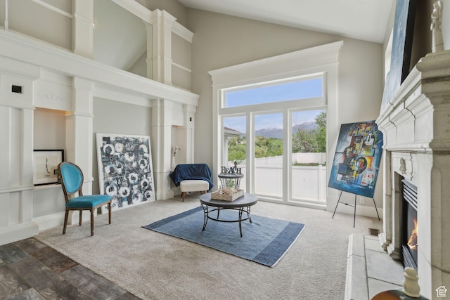 1001 E 1500 N, Layton, UT 84040 - sitting room with a high end fireplace, high vaulted ceiling, and wood finished floors