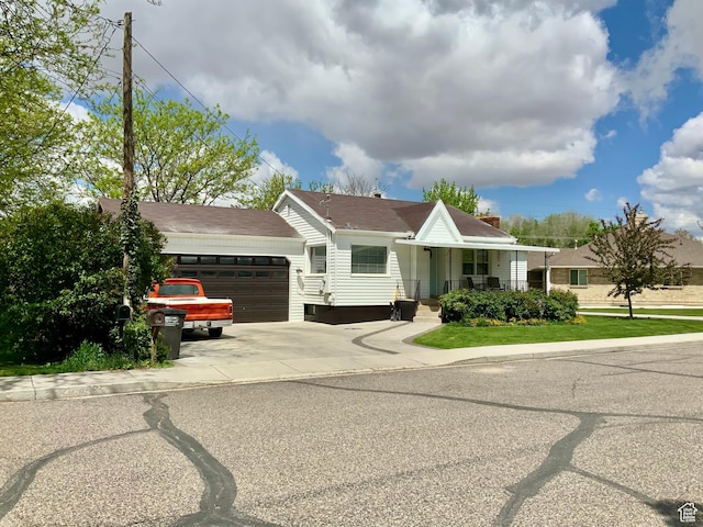 229 N 300 W, Salina, UT 84654 - ranch-style home featuring a garage, concrete driveway, and covered porch