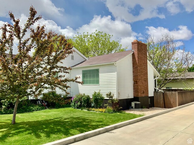229 N 300 W, Salina, UT 84654 - view of home's exterior featuring cooling unit and a chimney