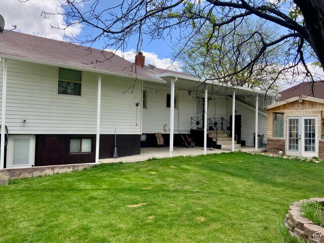 229 N 300 W, Salina, UT 84654 - back of property with french doors, a yard, and a chimney