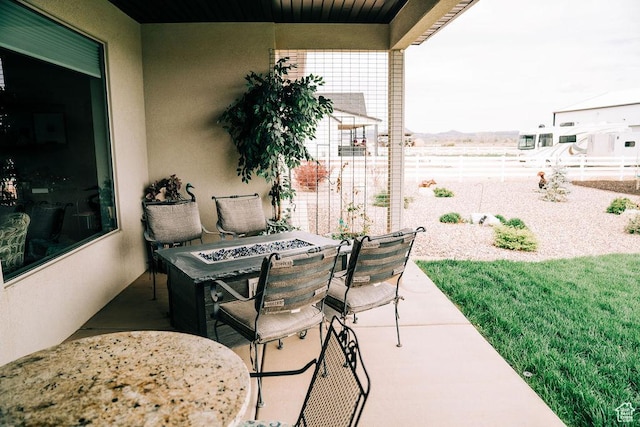 2366 W 3750 N, Cedar City, UT 84721 - view of patio / terrace with an outdoor fire pit and fence