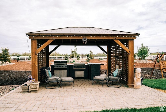 2366 W 3750 N, Cedar City, UT 84721 - view of patio / terrace featuring a gazebo, fence, exterior kitchen, and grilling area