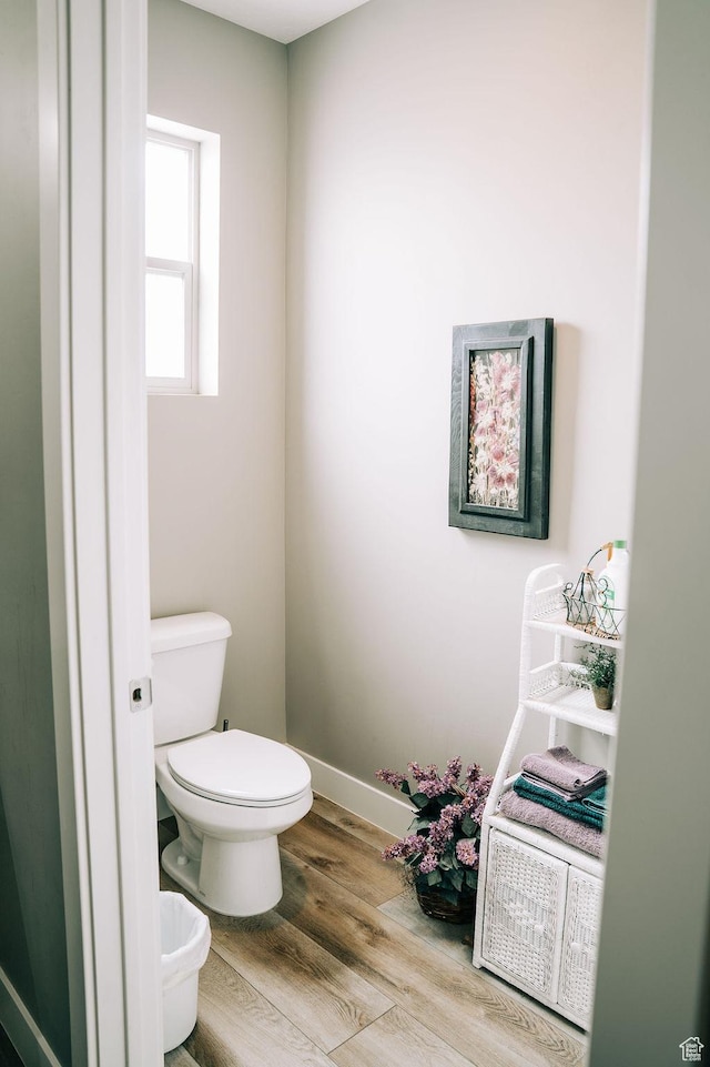 2366 W 3750 N, Cedar City, UT 84721 - bathroom with wood finished floors, toilet, and baseboards
