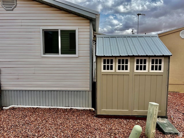 1150 W Red Hills Pkwy Unit 140, Washington, UT 84780 - view of home's exterior featuring metal roof
