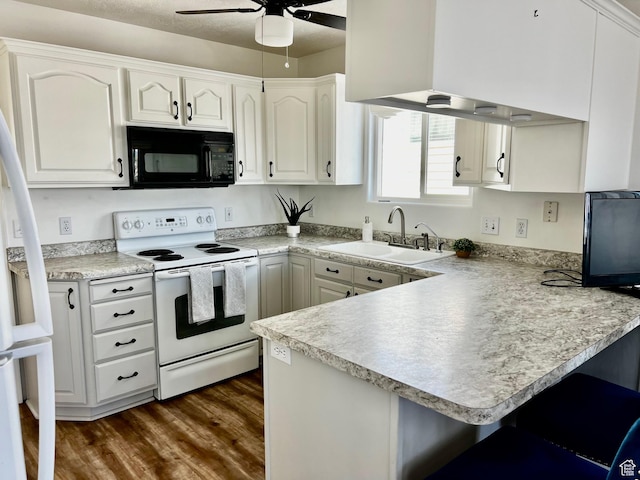 1150 W Red Hills Pkwy Unit 140, Washington, UT 84780 - kitchen featuring white appliances, a sink, a peninsula, ceiling fan, and white cabinets