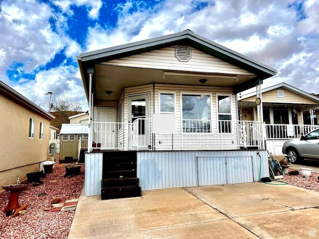 1150 W Red Hills Pkwy Unit 140, Washington, UT 84780 - view of front facade with a porch