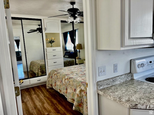 1150 W Red Hills Pkwy Unit 140, Washington, UT 84780 - bedroom with wood finished floors