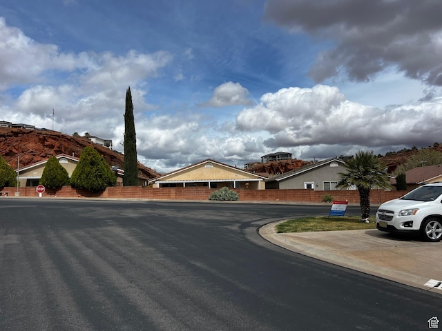 1150 W Red Hills Pkwy Unit 140, Washington, UT 84780 - view of asphalt street with curbs
