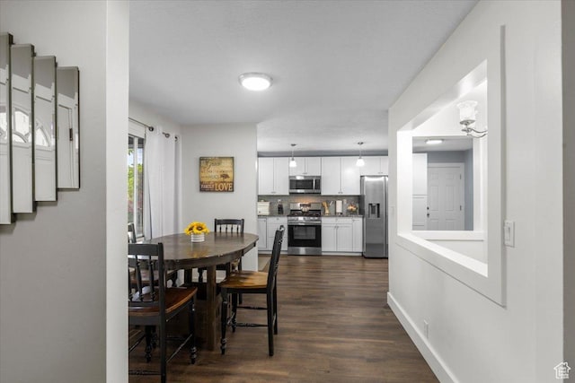 131 N 100 W, Hyrum, UT 84319 - dining area with dark wood-style floors
