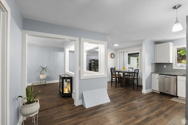 131 N 100 W, Hyrum, UT 84319 - kitchen with dishwasher, white cabinets, dark wood-type flooring, a textured ceiling, and decorative backsplash