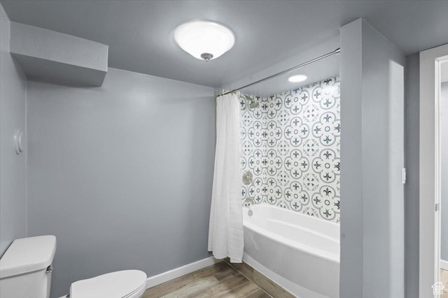 131 N 100 W, Hyrum, UT 84319 - bathroom with toilet, wood finished floors, shower / tub combo, and baseboards