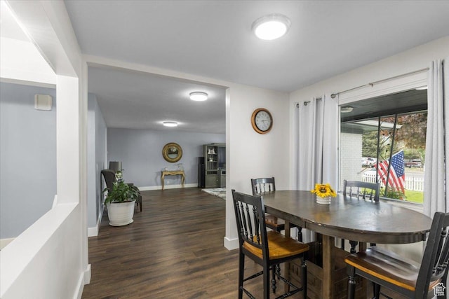 131 N 100 W, Hyrum, UT 84319 - dining area featuring baseboards and dark wood-style floors