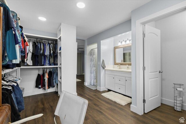 131 N 100 W, Hyrum, UT 84319 - spacious closet with dark wood finished floors and a sink
