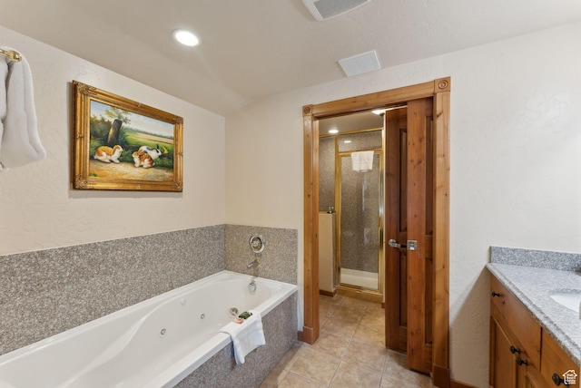 840 Bigler Ln Unit 3031, Midway, UT 84049 - bathroom with a stall shower, a tub with jets, tile patterned flooring, vanity, and recessed lighting