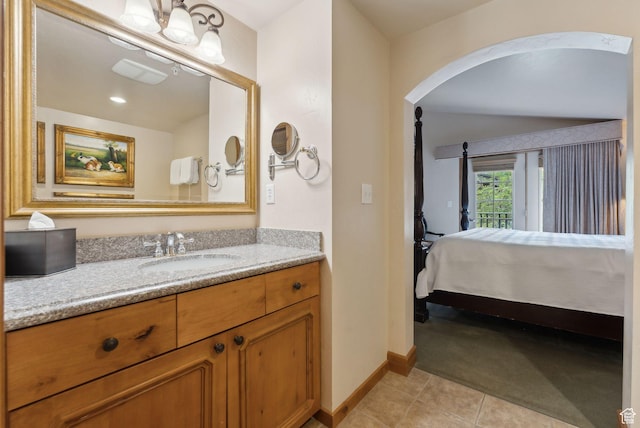 840 Bigler Ln Unit 3031, Midway, UT 84049 - bathroom featuring baseboards, tile patterned flooring, vanity, and connected bathroom