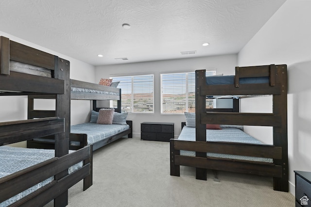 1445 N Arena Roja Dr, Washington, UT 84780 - carpeted bedroom with a textured ceiling and recessed lighting