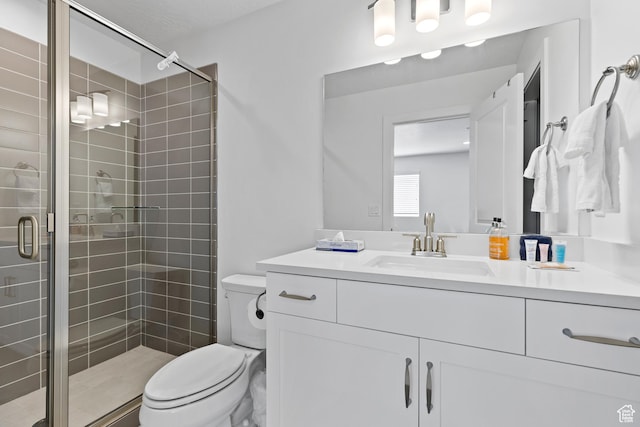 1445 N Arena Roja Dr, Washington, UT 84780 - bathroom with toilet, a shower stall, and vanity