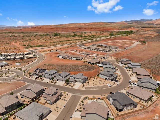 1445 N Arena Roja Dr, Washington, UT 84780 - aerial view of property and surrounding area with a mountainous background and nearby suburban area