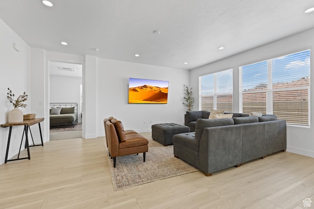 1445 N Arena Roja Dr, Washington, UT 84780 - living area featuring light wood-type flooring, recessed lighting, and baseboards