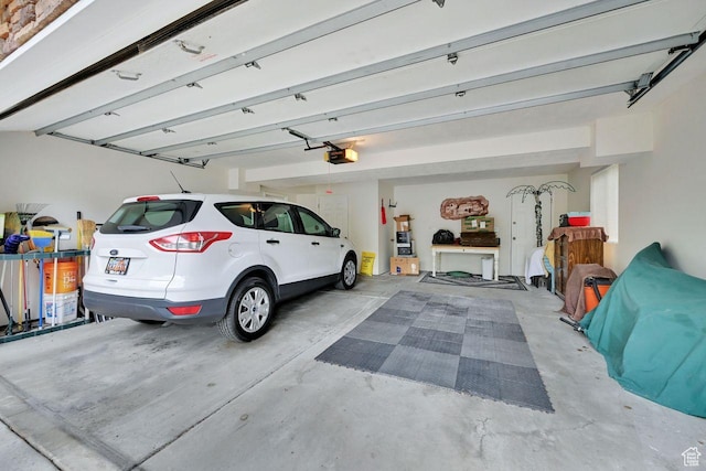 1076 E Creekside, Ogden, UT 84404 - garage featuring a garage door opener