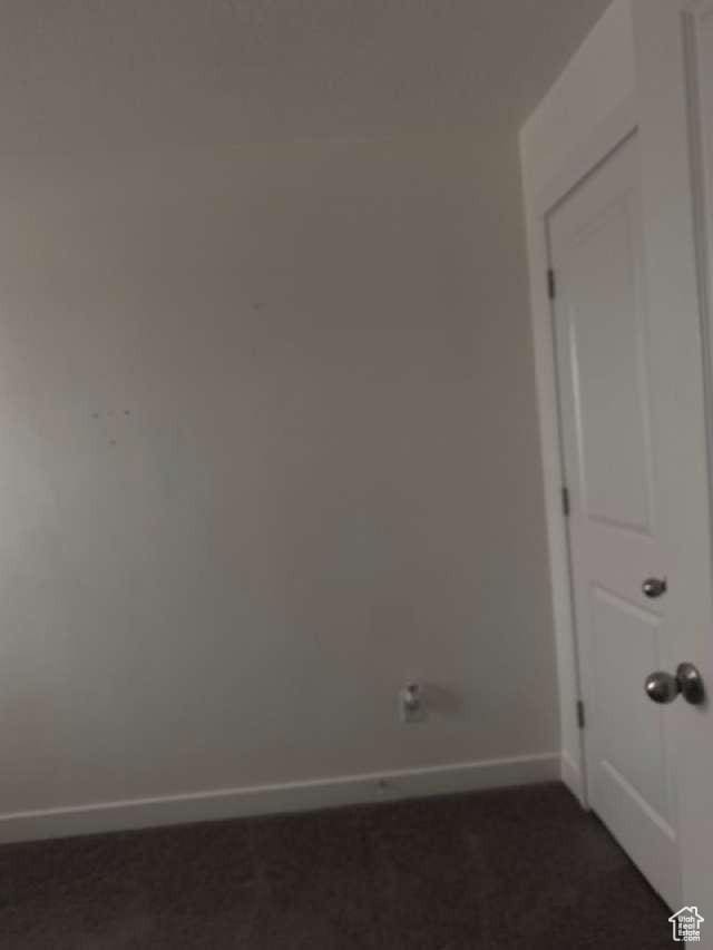 5841 W Lake Ave, South Jordan, UT 84009 - spare room featuring baseboards