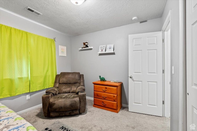 1298 S 1410 E, Provo, UT 84606 - living area with carpet flooring, a textured ceiling, and baseboards