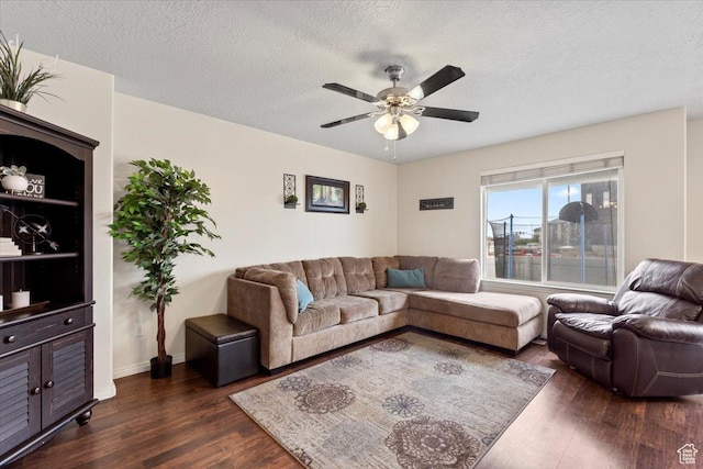 1298 S 1410 E, Provo, UT 84606 - living area featuring dark wood-style flooring, a ceiling fan, and a textured ceiling