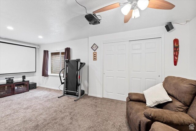 1298 S 1410 E, Provo, UT 84606 - carpeted home theater featuring baseboards, a ceiling fan, and a textured ceiling