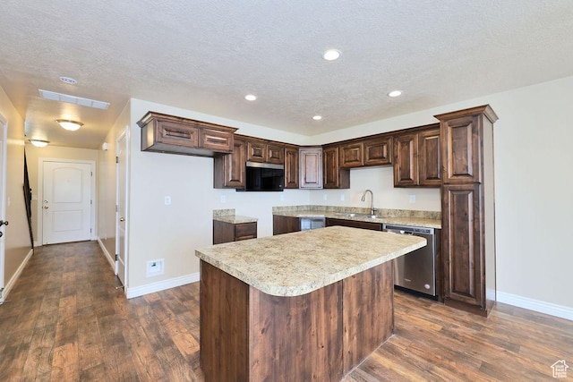1852 E Whitetail Dr N Unit 106, Layton, UT 84040 - kitchen featuring dishwasher, baseboards, dark brown cabinets, dark wood-style floors, and a textured ceiling