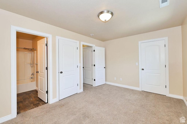 1852 E Whitetail Dr N Unit 106, Layton, UT 84040 - unfurnished bedroom featuring carpet, baseboards, and ensuite bath