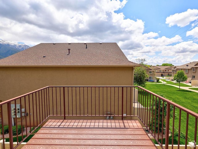 1852 E Whitetail Dr N Unit 106, Layton, UT 84040 - deck featuring a residential view and a lawn