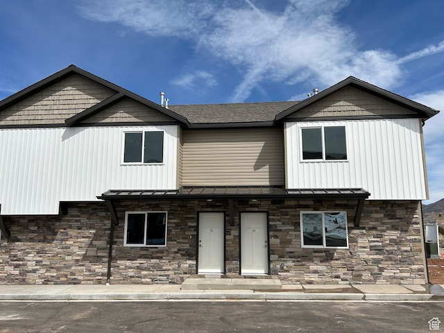 920 S 25 E # 18E, Cedar City, UT 84720 - view of front of property featuring stone siding, a standing seam roof, and metal roof