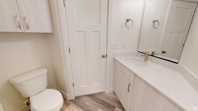 920 S 25 E # 18E, Cedar City, UT 84720 - half bath featuring toilet, wood finished floors, vanity, and baseboards