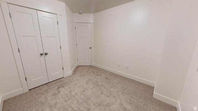 920 S 25 E # 18E, Cedar City, UT 84720 - unfurnished bedroom with carpet floors, baseboards, and a closet
