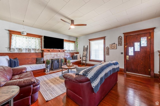 212 E 100 S, Payson, UT 84651 - living area featuring wood-type flooring, a ceiling fan, baseboards, and a glass covered fireplace