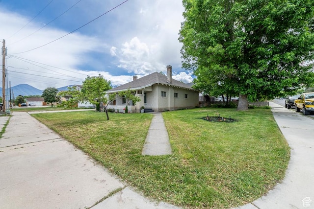 212 E 100 S, Payson, UT 84651 - view of front of house with a front yard and a mountain view