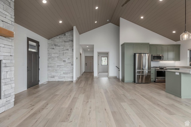 unfurnished living room featuring light wood finished floors, high vaulted ceiling, wood ceiling, and recessed lighting