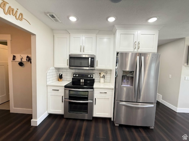kitchen featuring appliances with stainless steel finishes, baseboards, dark wood-style floors, light countertops, and recessed lighting