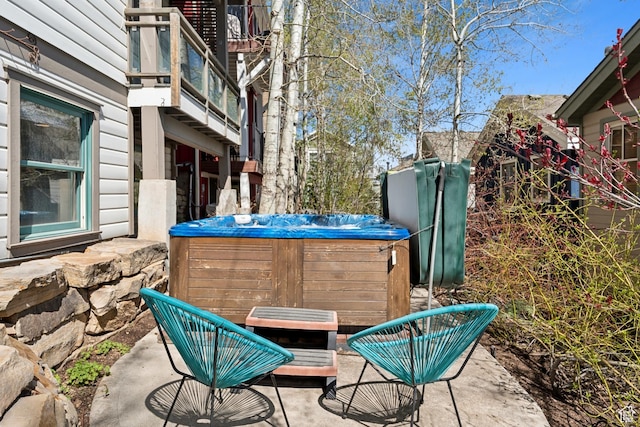 view of patio featuring a hot tub