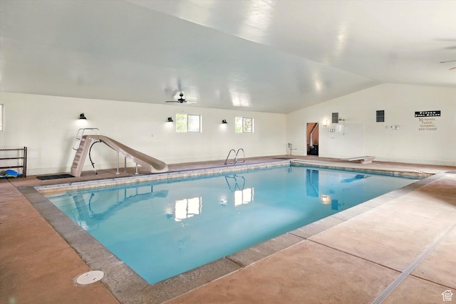 3703 W 600 S, Logan, UT 84321 - indoor pool featuring a water slide, a ceiling fan, and a diving board